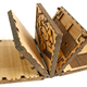 Illustration for article titled You Must Solve a Puzzle to Turn Every Page in This Beautiful Wooden Book